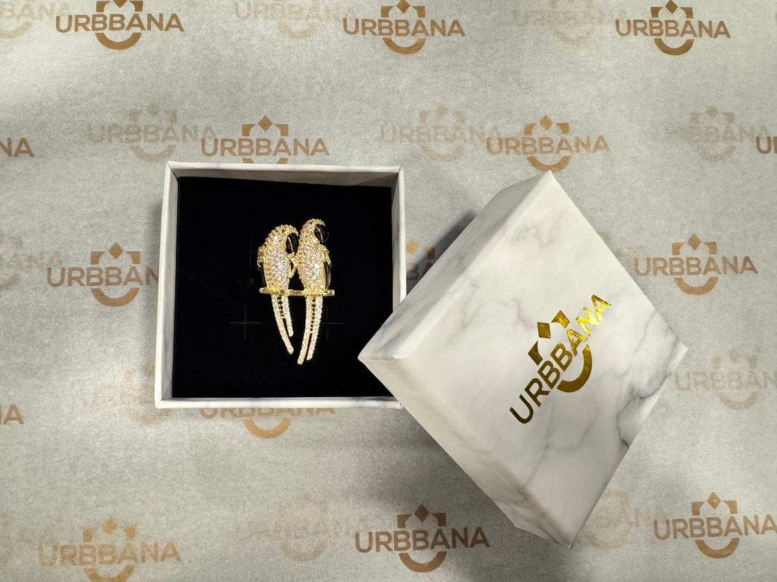 Embellished parrot-shaped lapel pin with intricate design