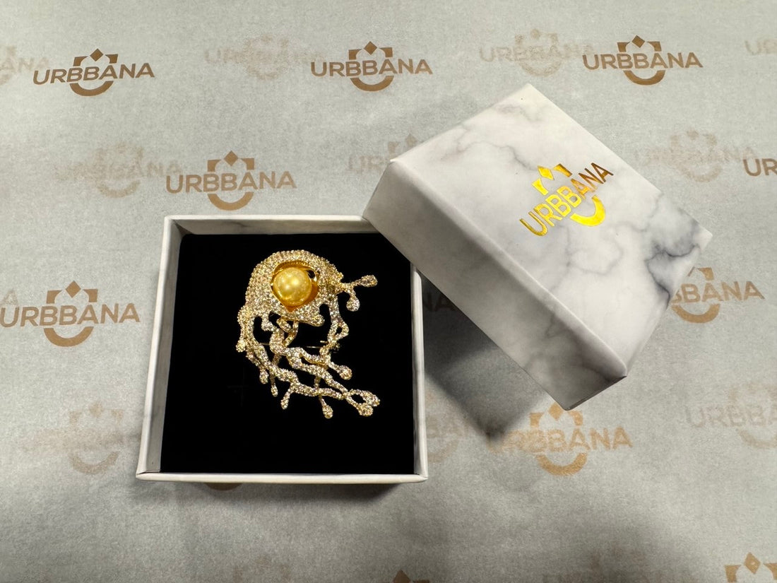 Luxury gold pearl lapel pin with ornate embellishments