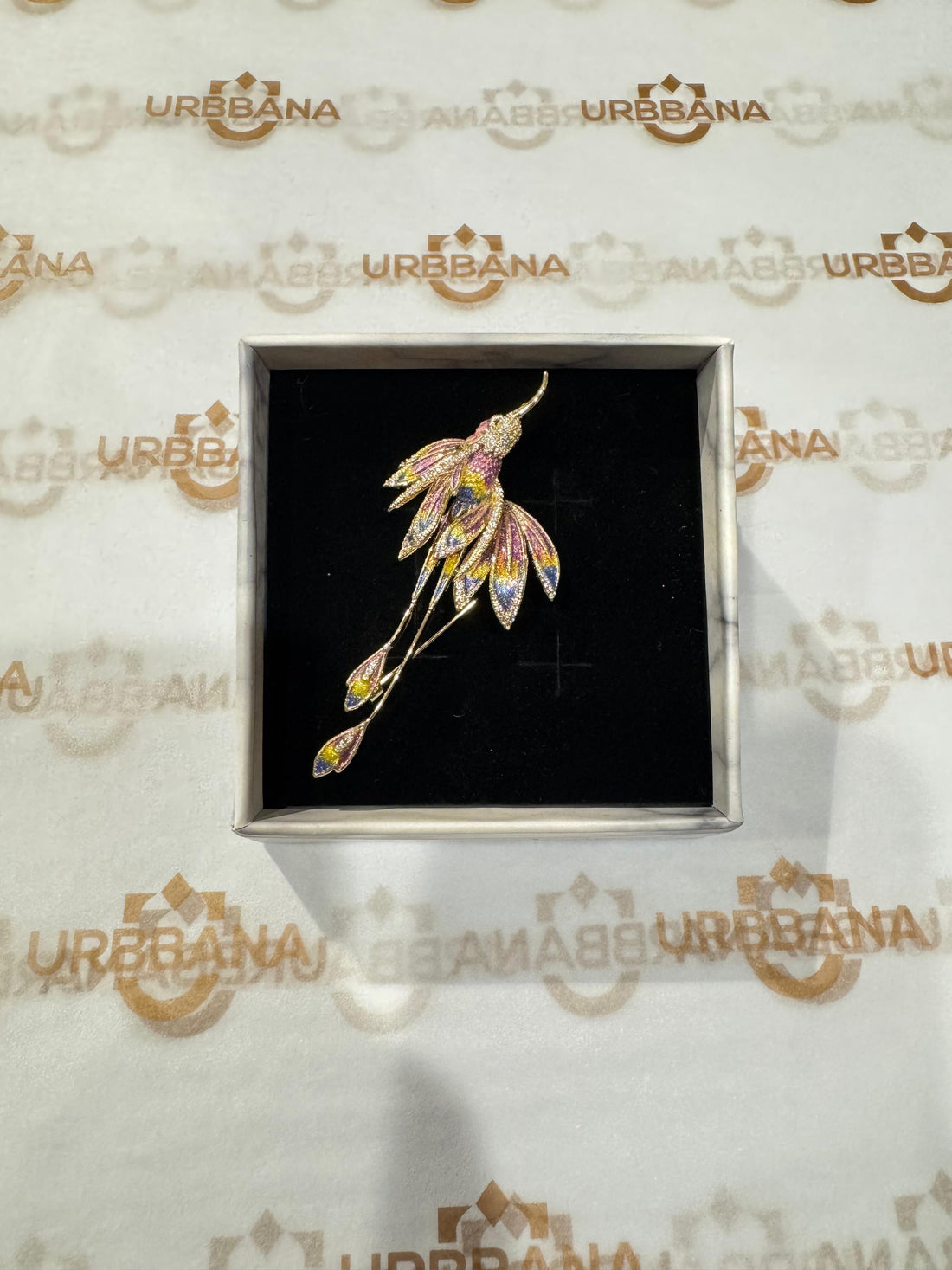 Luxury lapel pin with ornate embellishments