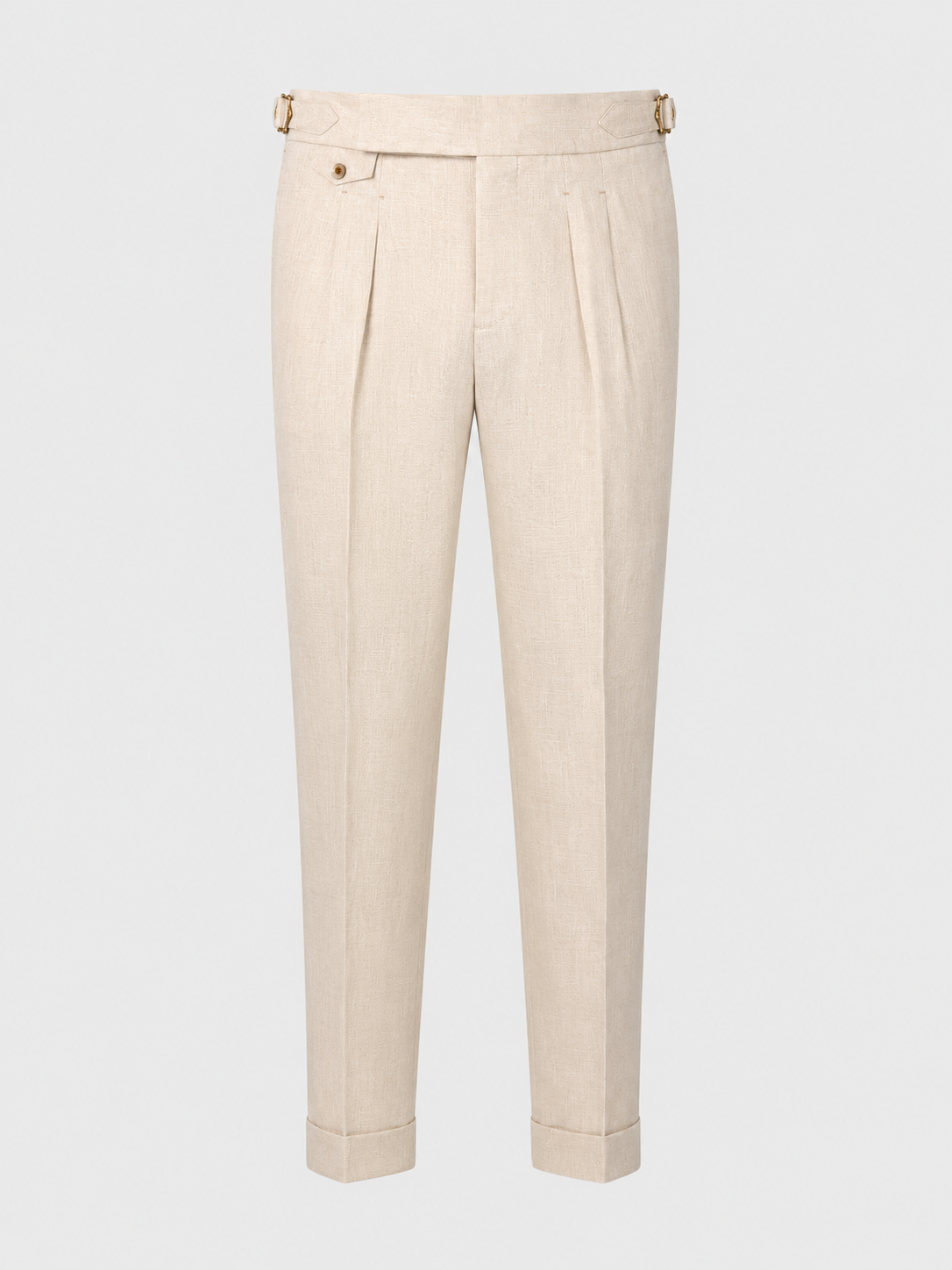 Beige trousers with pleated front details, a button closure, and adjustable belt loops, shown against a light gray background.