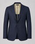 A navy blue single-breasted suit jacket with notch lapels and a two-button closure, featuring a patterned beige and gold paisley lining visible inside the collar, set against a solid gray background.