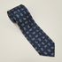 The Roma Tie - silk tie laid flat on light grey background