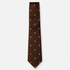 The Bari Tie – brown and gold fleur-de-lis silk tie on a light grey background