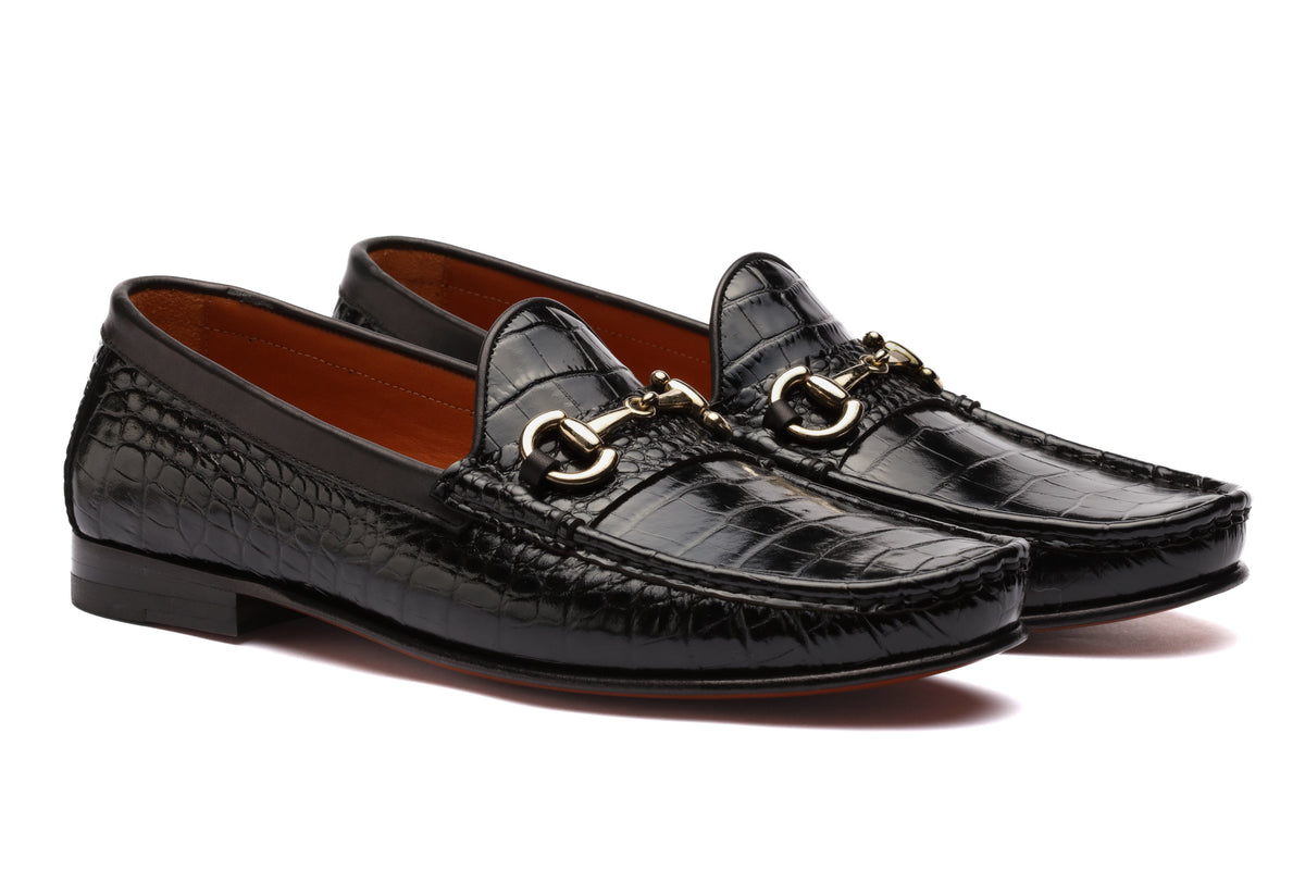 URBBANA black croco-embossed horsebit moccasins.