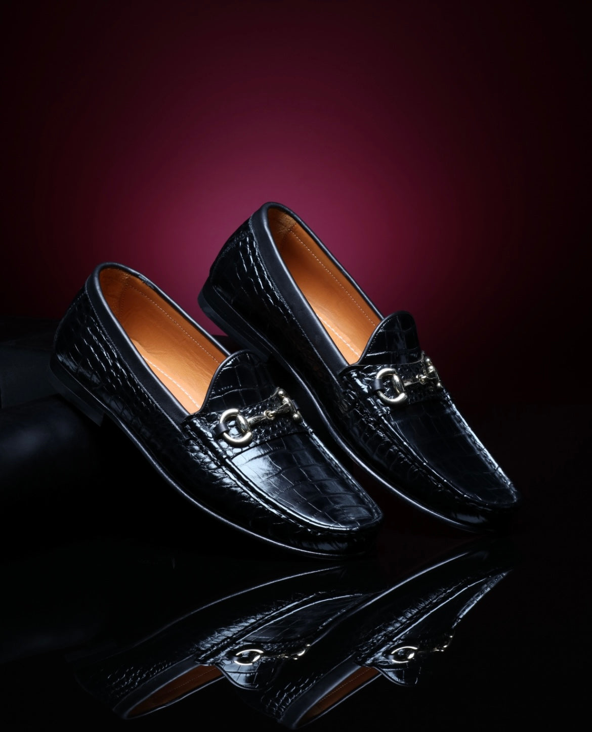URBBANA black croco-embossed horsebit moccasins.