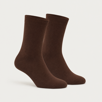 Brown dress socks by URBBANA on a light grey studio background