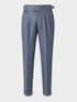 Byron denim-blue pleated trousers with side adjusters and cuffed hems.
