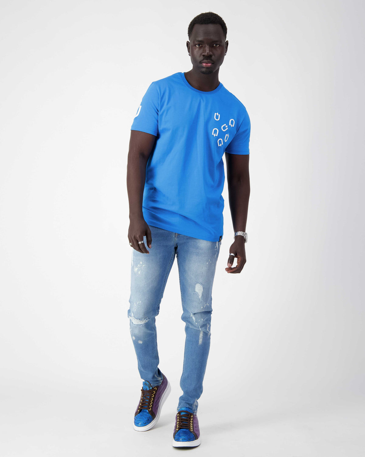 URBBANA electric-blue cotton T-shirt with Multi-U embroidery.