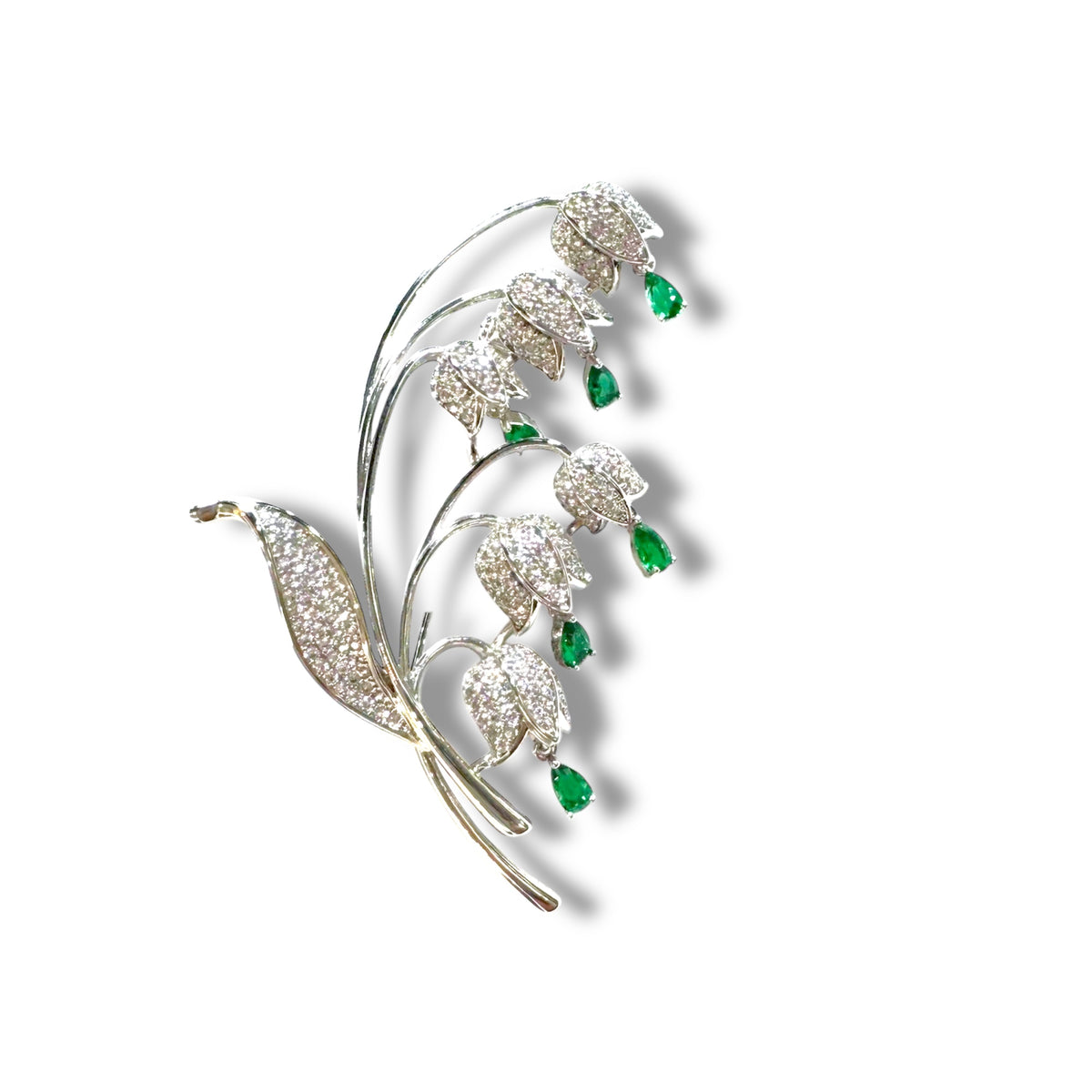 URBBANA embellished lapel pin.