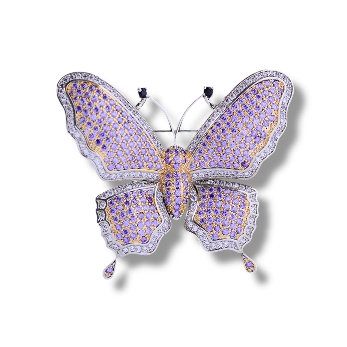 URBBANA embellished lapel pin.
