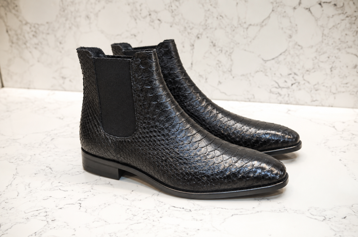URBBANA Black Snakeskin Chelsea Boots, angled pair.