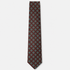 The Rimini Tie – brown, turquoise and red geometric square silk tie on a light grey background